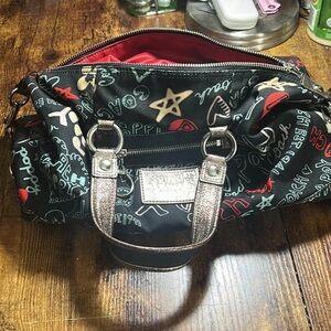 Coach Black Graffiti Print Satchel with Red Lining and Metallic Handles